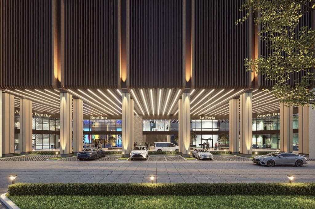Grand drop-off lobby at Causewayz Square @ JBCC Tower A & C by EXSIM, featuring modern architectural lighting and upscale retail frontage