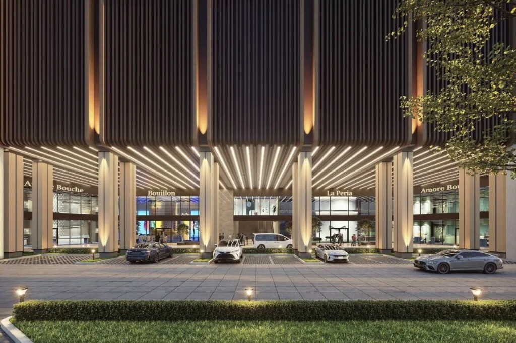 Grand drop-off lobby at Causewayz Square @ JBCC Tower A & C by EXSIM, featuring modern architectural lighting and upscale retail frontage