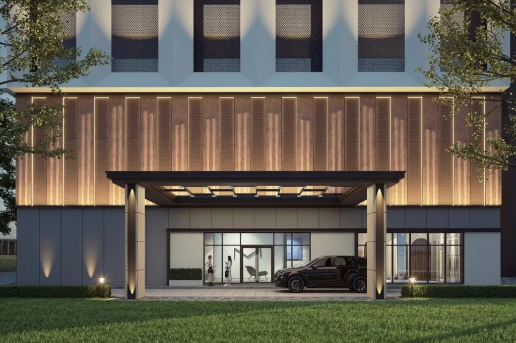 Drop-off lobby entrance at Tower B 1(Brixton) of EXSIM CIQ Causewayz Square @ JBCC, featuring elegant lighting, modern canopy, and luxury car access.