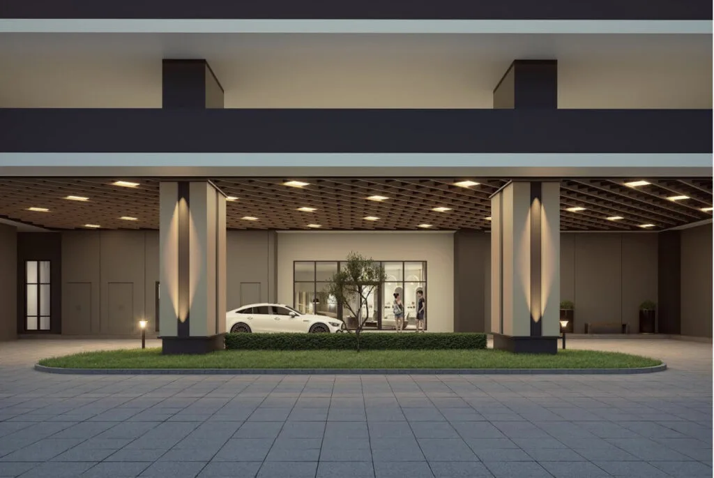 Covered lower ground lobby for Tower B 2 (Brixton) at Causewayz Square @ JBCC by EXSIM, showcasing upscale entrance with soft-lit pillars and green elements