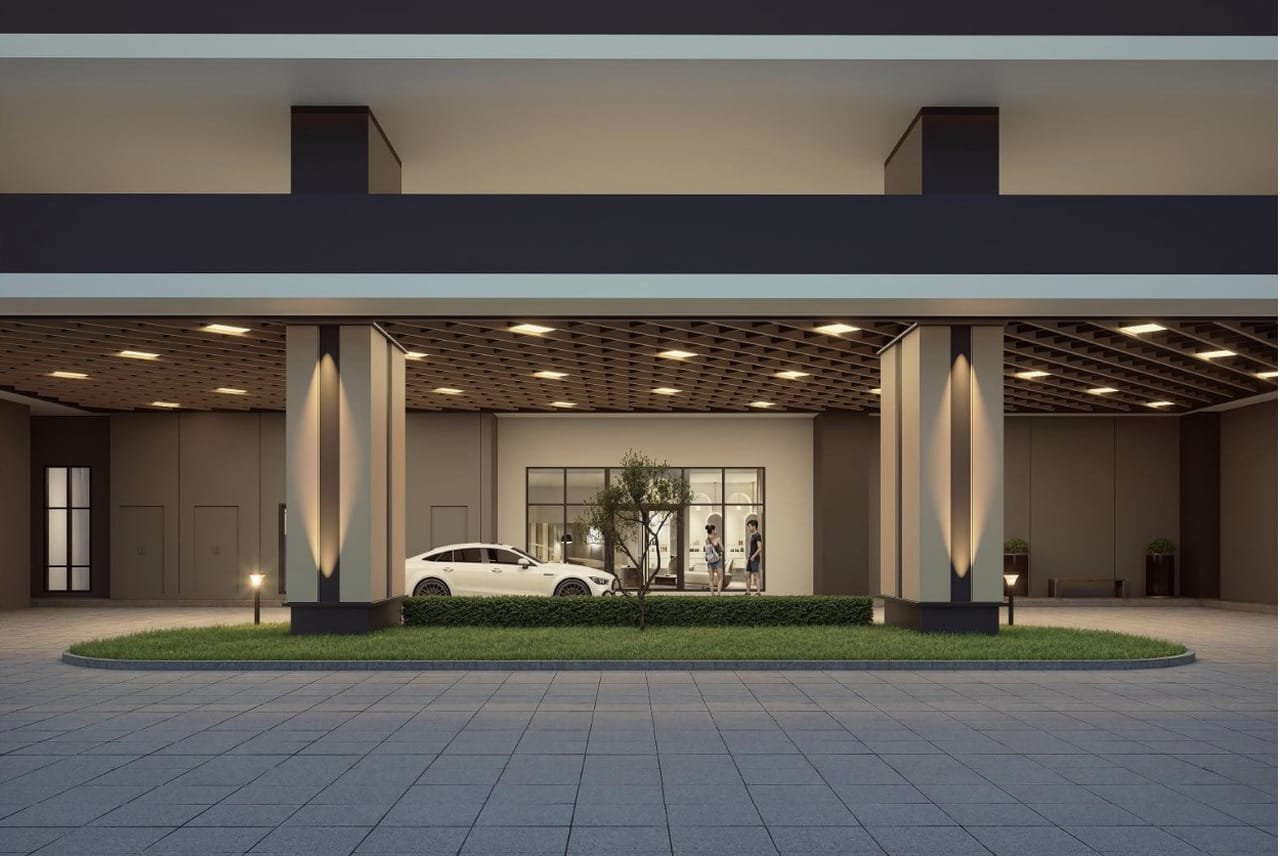 Covered lower ground lobby for Tower B 2 (Brixton) at Causewayz Square @ JBCC by EXSIM, showcasing upscale entrance with soft-lit pillars and green elements