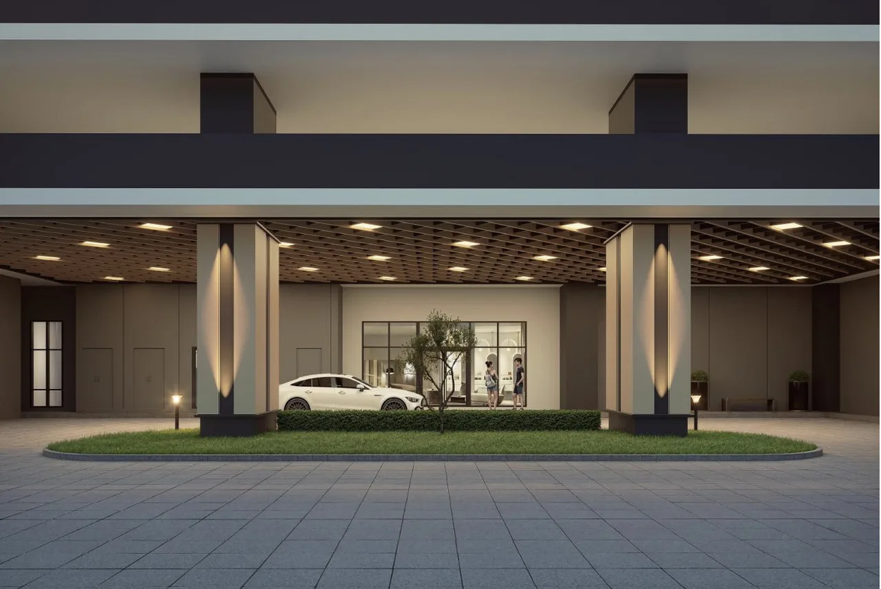 Covered lower ground lobby for Tower B 2 (Brixton) at Causewayz Square @ JBCC by EXSIM, showcasing upscale entrance with soft-lit pillars and green elements