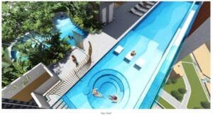 Aerial view of sky roof swimming and leisure area at Axis Tower, Causewayz Square @ JBCC, highlighting the wave pool, lounge deck, and nature garden within the exsim ciq lifestyle facilities.