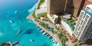 Marina & Waterfront Bird’s Eye View | exsim sabah new project Aerial view of The Bedrock @ Jesselton Docklands with marina, waterfront boulevard, and integrated podium lifestyle facilities by EXSIM Sabah