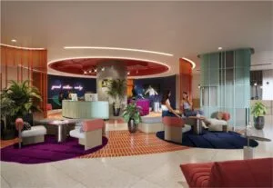 Colorful and contemporary lobby of The Bedrock development in Jesselton Docklands by EXSIM Sabah, designed to welcome residents and guests in style.