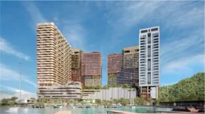 Seafront view of The Bedrock @ Jesselton Docklands by EXSIM Sabah, showing the full waterfront development against a backdrop of the South China Sea.