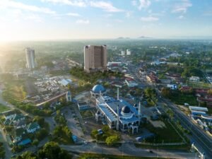 Aerial superimposed view of Erinaz Suites @ Kubang Kerian by EXSIM showing the tower location near surrounding township, mosque and major road access.