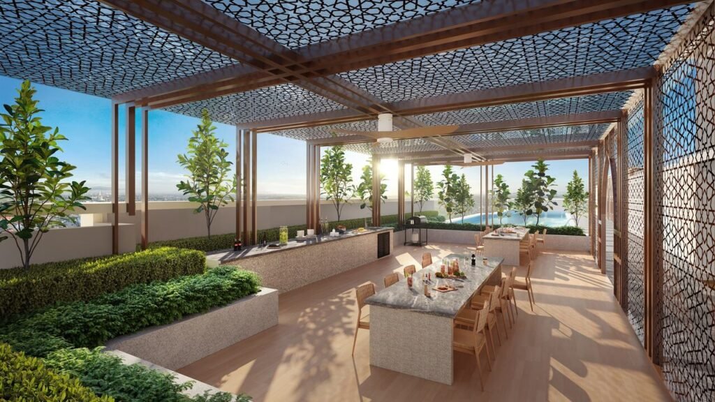 Rooftop BBQ garden at Erinaz Suites @ Kubang Kerian featuring outdoor dining tables, grill area, shaded pergola and open-air gathering space.