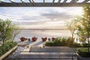 Sunken oasis relaxation area at Keeperz Suites Penang featuring tranquil seating and water features overlooking the seafront environment.