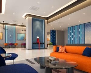 Elegant lobby at The Lighthauz Residences Penang showcasing modern interior design, vibrant colour accents and welcoming seating area, reflecting premium living standards of exsim lighthauz residences.