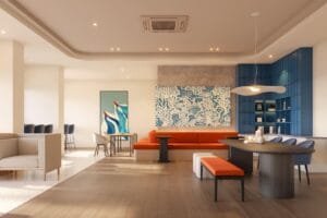 Modern co-working and lounge space at The Lighthauz Residences Penang featuring stylish seating, warm lighting and contemporary interior design, providing a comfortable environment for work and relaxation in lighthauz penang.