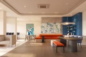 Modern co-working and lounge space at The Lighthauz Residences Penang featuring stylish seating, warm lighting and contemporary interior design, providing a comfortable environment for work and relaxation in lighthauz penang.