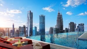 Rooftop infinity pool at Phoeniz Suites @ KLCC, an EXSIM new project with Kuala Lumpur city skyline and KLCC view.
