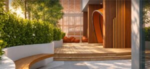 The Bench is a small outdoor sitting space with curved built-in seating along its edge. A few steps lead to the timber platform, with orange lounge chairs and garden planting behind.