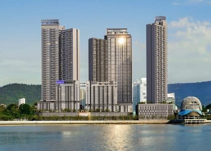 Front aerial view of The Lighthauz Residences Penang showcasing modern high-rise towers along the waterfront with surrounding city skyline and coastal scenery, highlighting its prime penang seafront condo location.